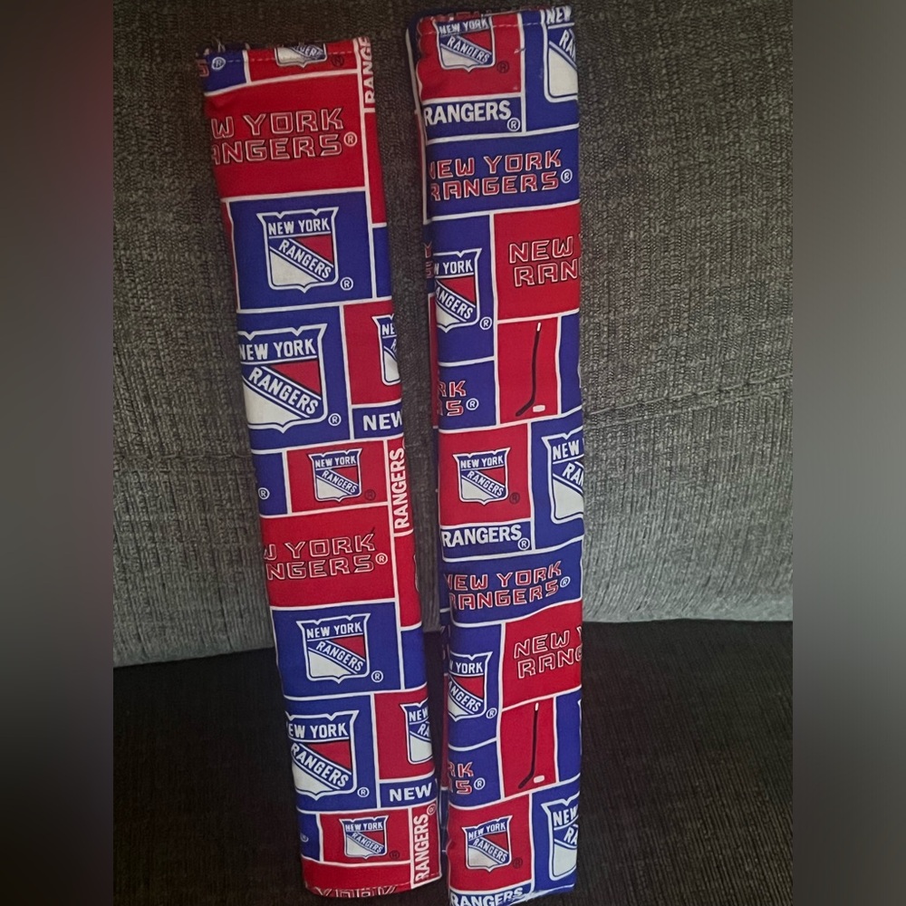 Set of two NY rangers seat belt covers.  Brand new.